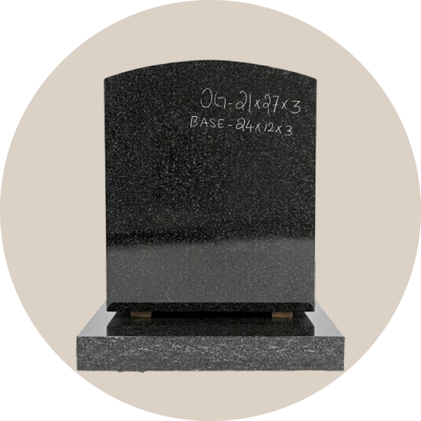 Regal black camber top headstone